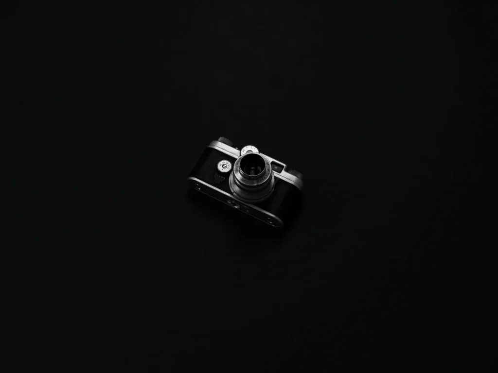 Vintage camera on a dark background — photography portfolio website project